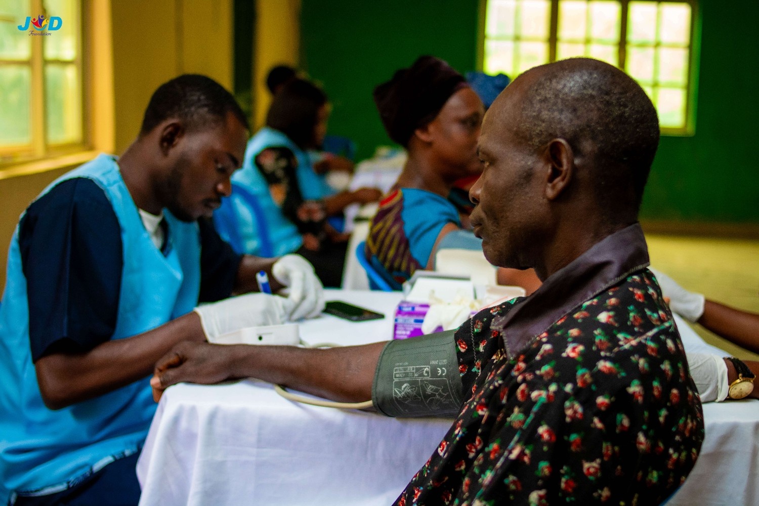 Teacher helping a student with writing
